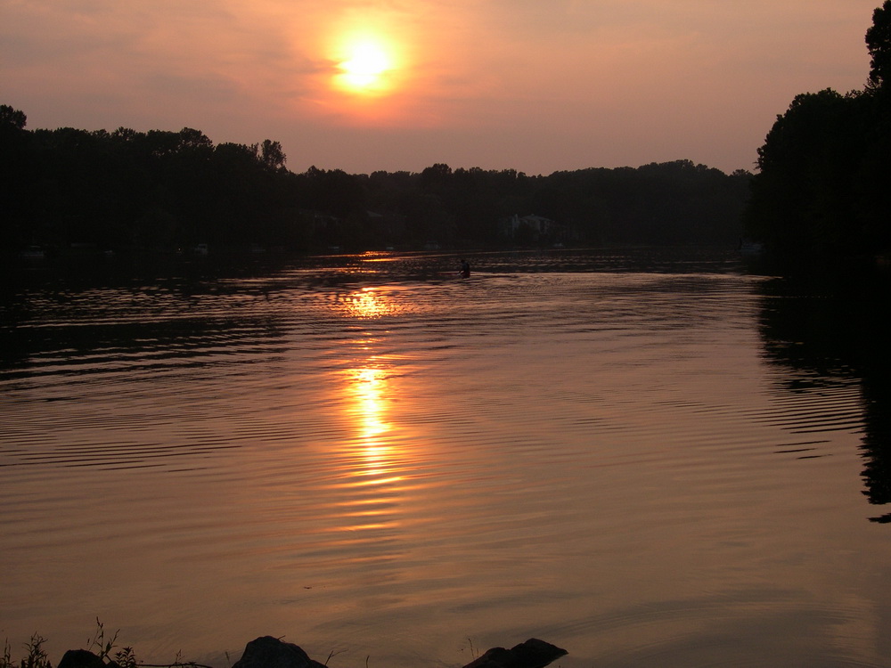 I sit at the dam while the sun slow sets