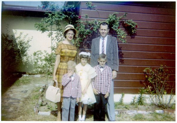 David, Brenda, Me with Mom and Dad in the back yard