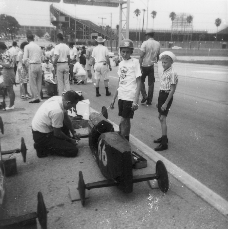Dad doing last minute tune up before my race. 