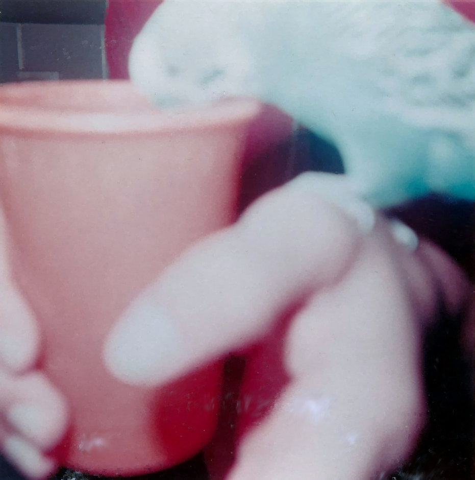 Pete drinking out of a cup