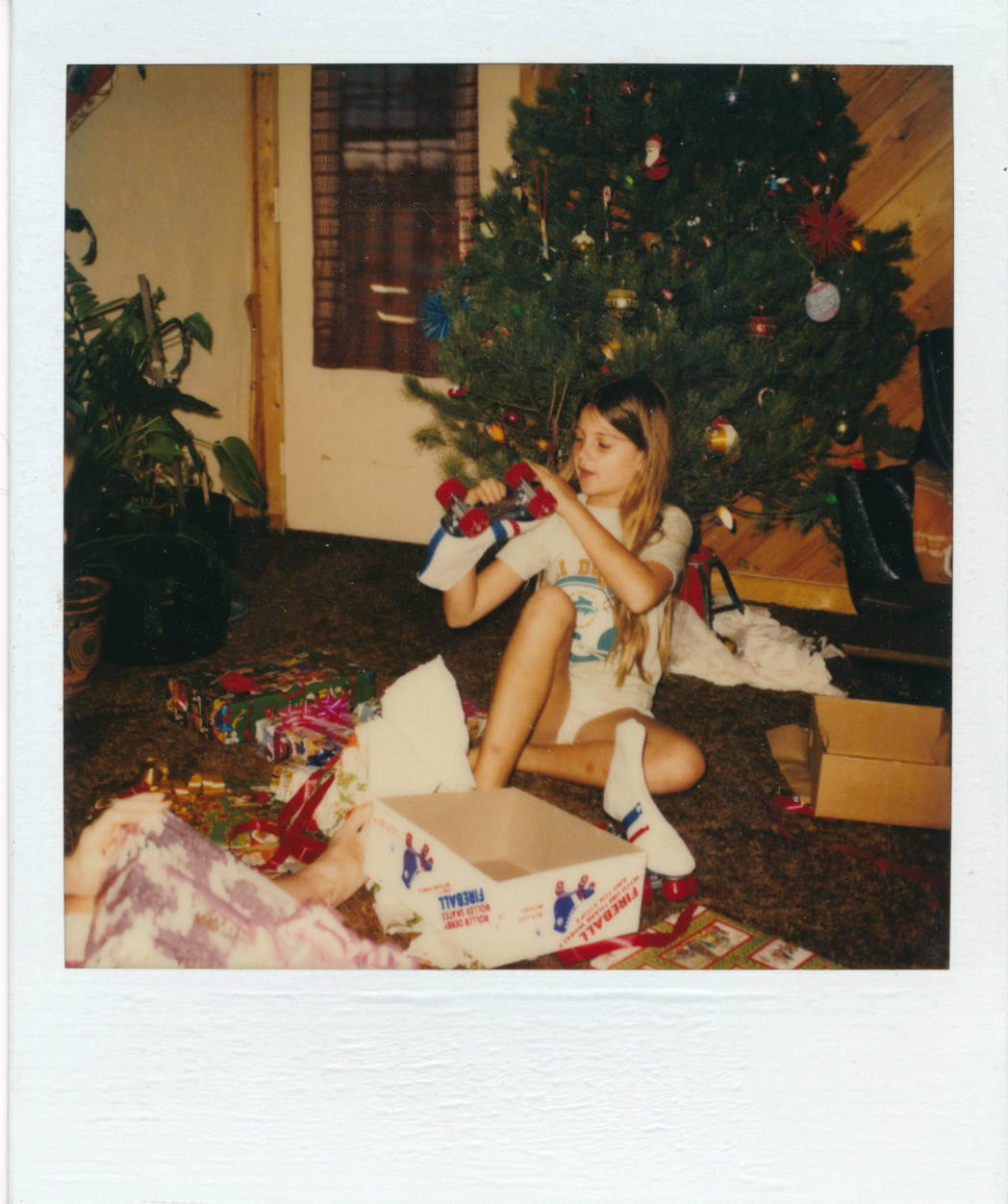 Anne opening Christmas presents