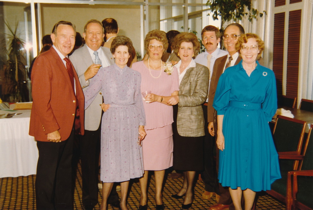 Dad with friends and family at retirment party
